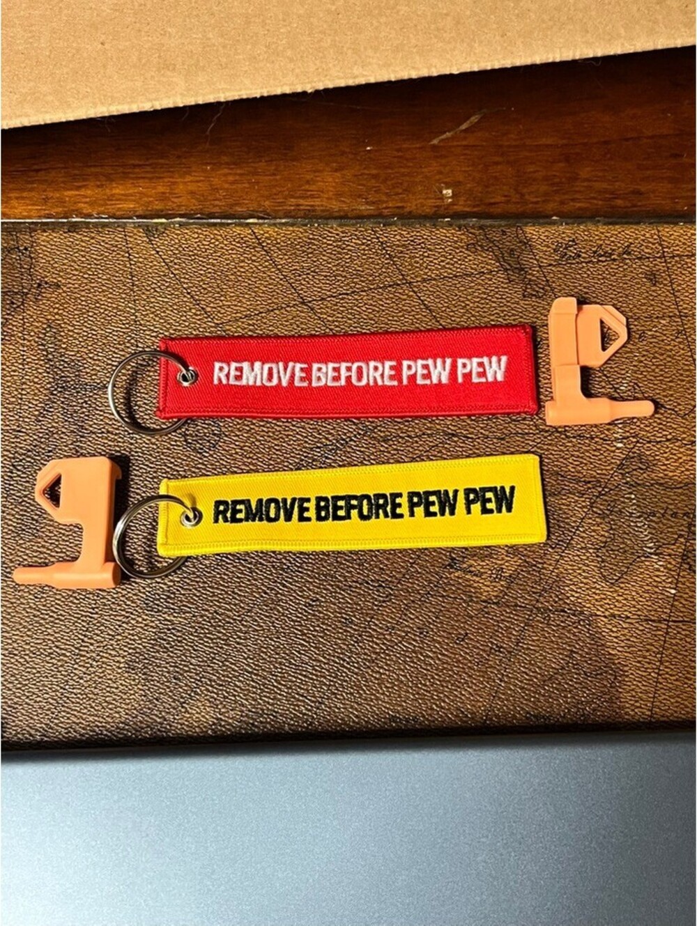 Bold 'REMOVE BEFORE PEW PEW' Chamber Safety Flags - fits most